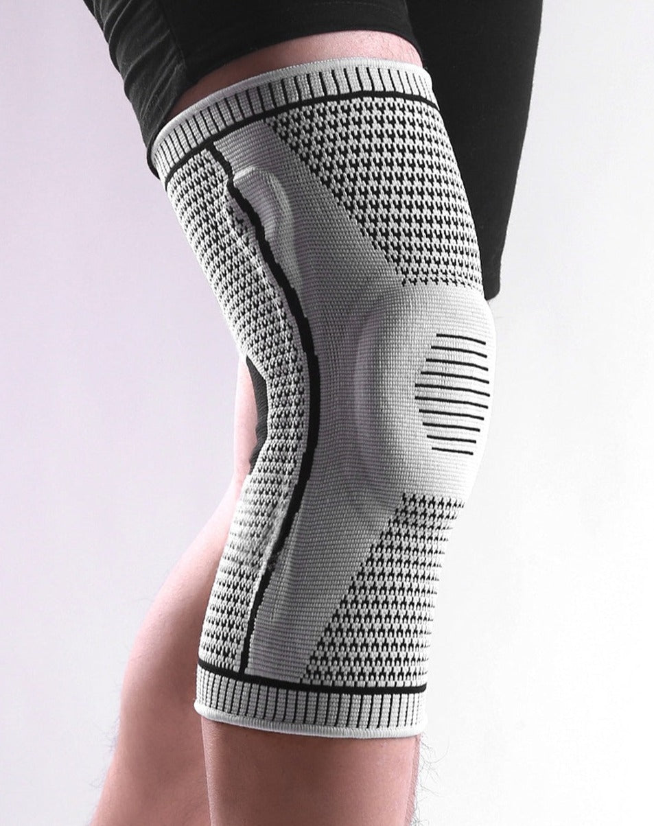 Genouillère ergonomique flexible de maintien sportif